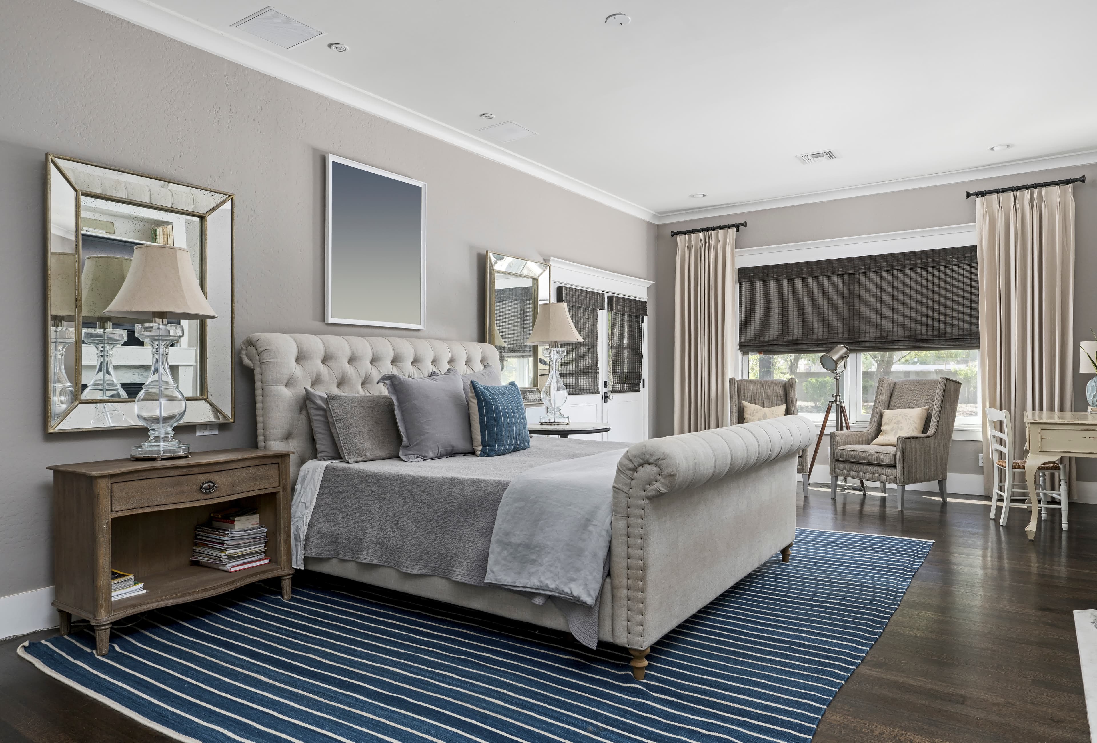 An elegant luxury master bedroom representing jumbo and high-balance rates