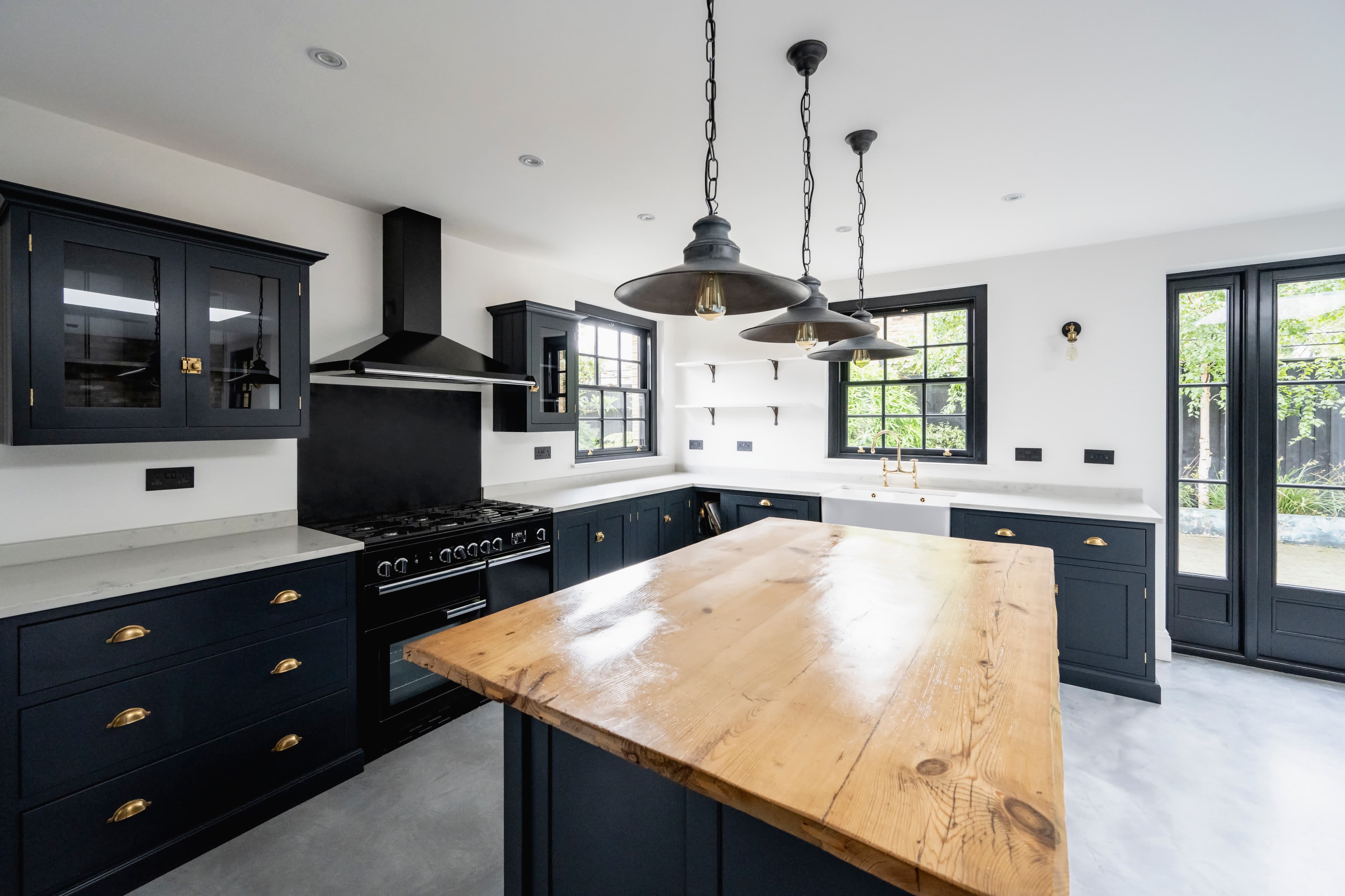A stylish kitchen with a reclaimed-wood island representing home equity loan rates
